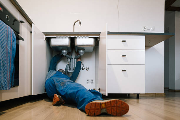 Professional Emergency Plumber technician working in Burgettstown, PA